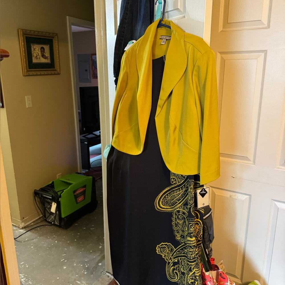 Vibrant Yellow Jacket with Elegant Black Dress